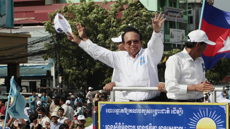  CNRP leader Kem Sokha greets supporters on the last day of campaigning ahead of local elections in 2017. He was detained a few months later and remains under house arrest [File: Heng Sinith/AP Photo] 